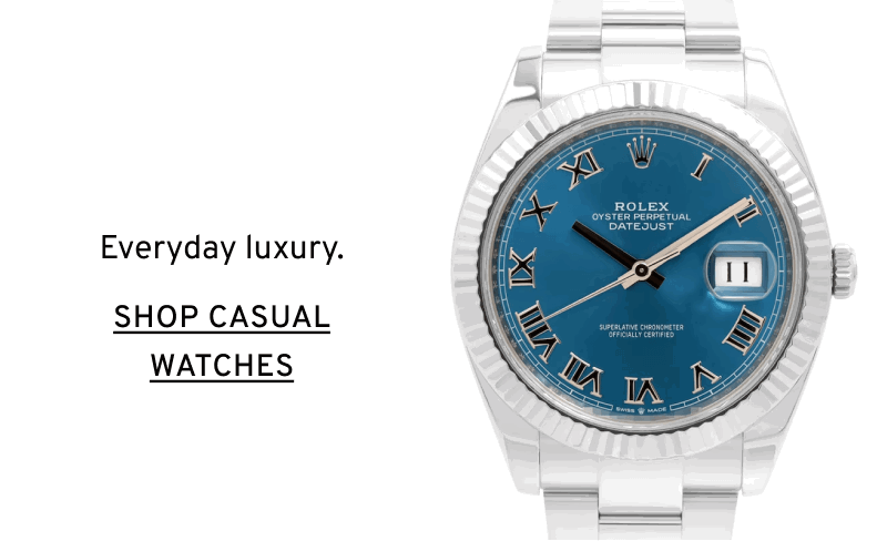 Silver watch with blue dial and date window. Everyday luxury. Click to Shop Casual Watches