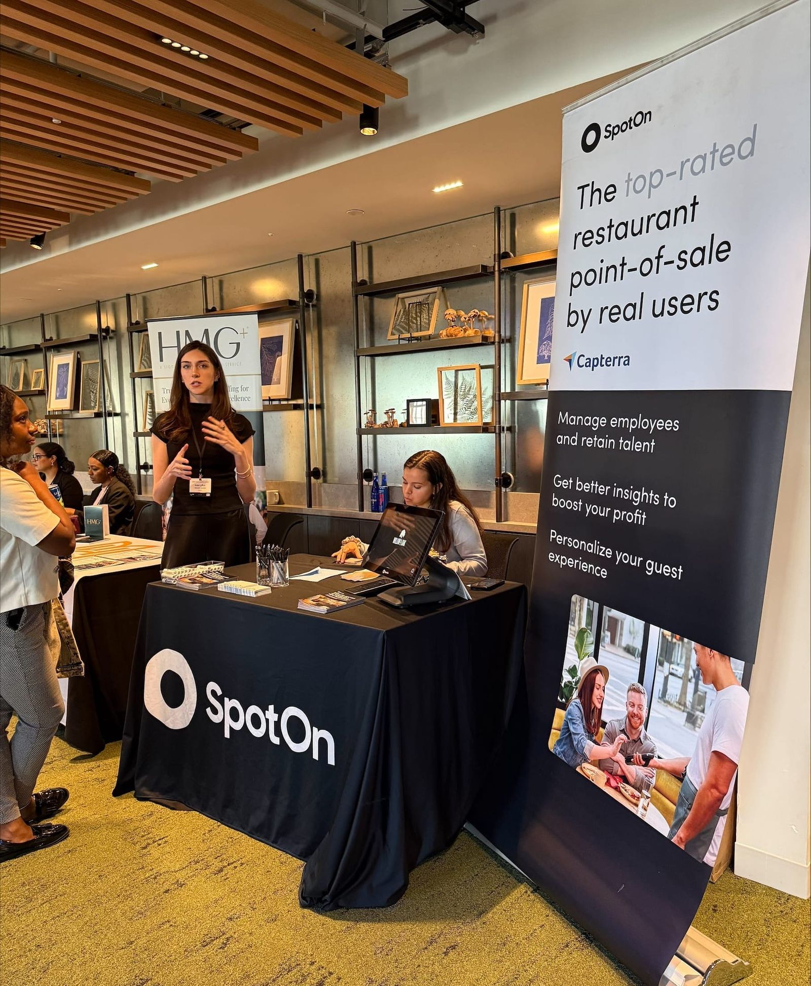 SpotOn promotional booth and representatives at the NYSRA Women in Hospitality event.