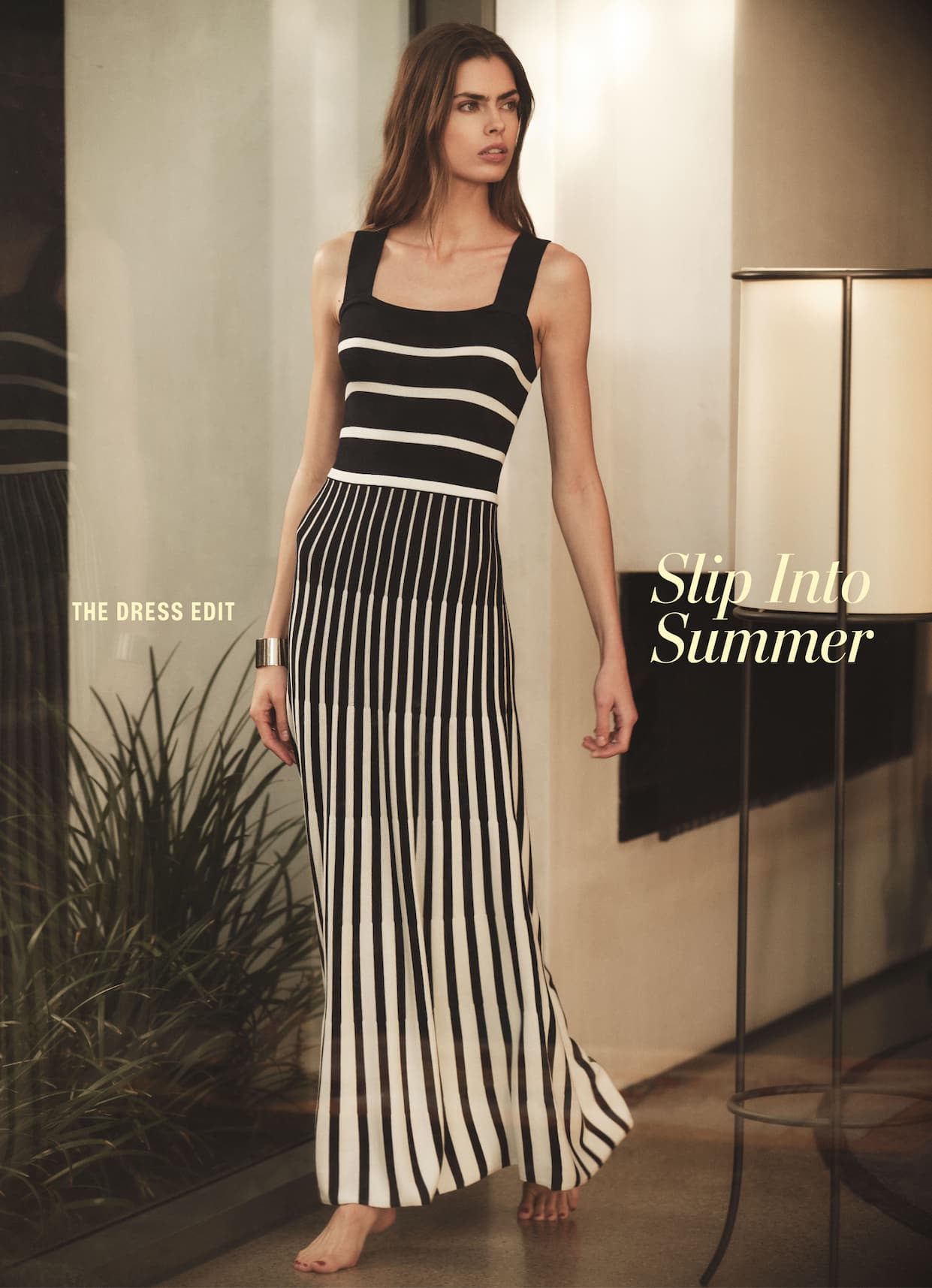 Image of model wearing Toma dress in black. Text also reads "The Dress Edit" and "Slip Into Summer"