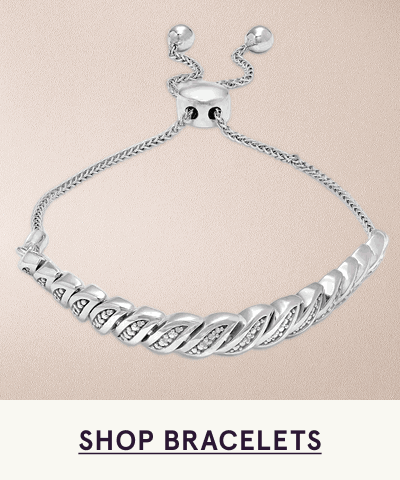Adjustable bolo-style chain with curved, textured bar accent lined with diamonds. Click here to shop bracelets