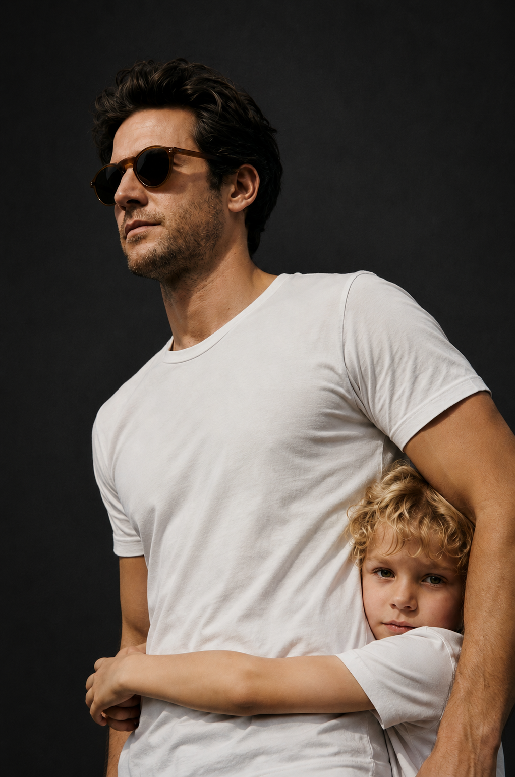 A man wearing the Capri Sunglasses and his son
