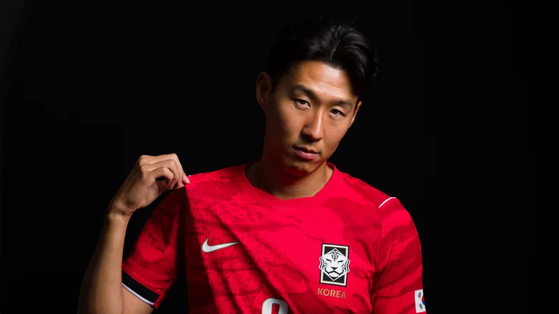 Image may contain: Son Heung-min, Clothing, Shirt, Person, Teen, Head, Face, and T-Shirt