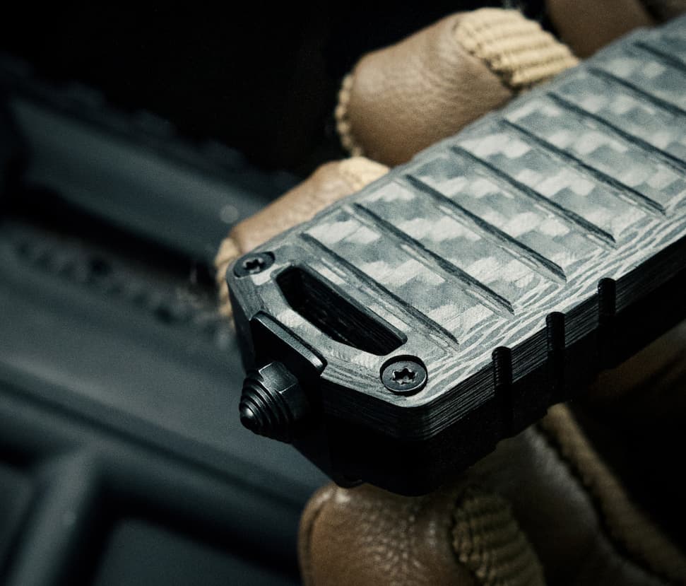 A2 Badger Mini Automatic OTF Knife Glass Breaker and Lanyard Hole Close-Up.
