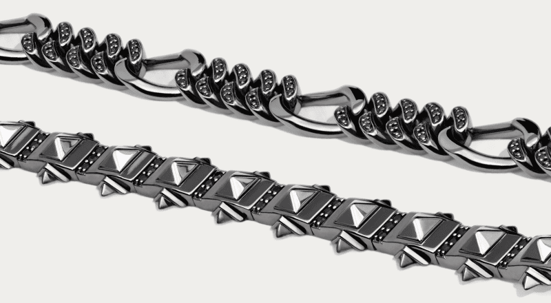 Black stainless steel bracelets featuring pavé chain links and geometric angular link designs.