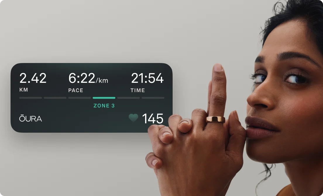 Woman with Deep Rose Oura Ring 5. App UI overlay with Live Activity Tracking UI Overlay