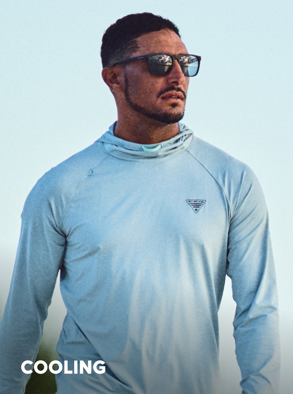 Headline: Cooling. A man wearing Columbia PFG. 