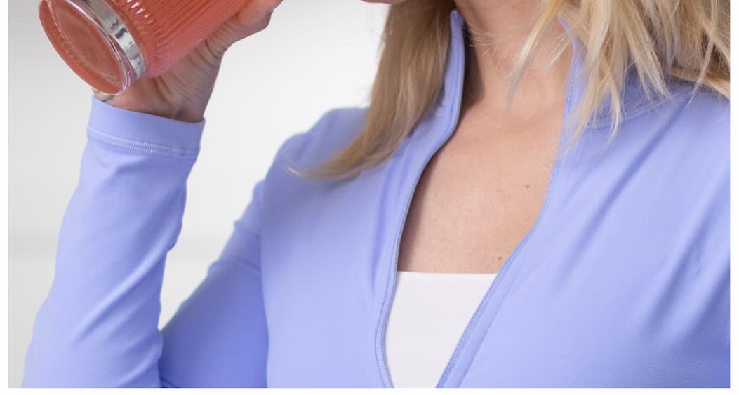 Woman drinking Slim Sips. 