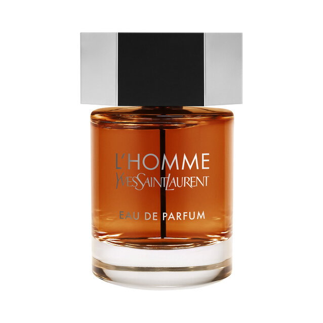 A bottle of YSL L'Homme Eau de Parfum with amber liquid.