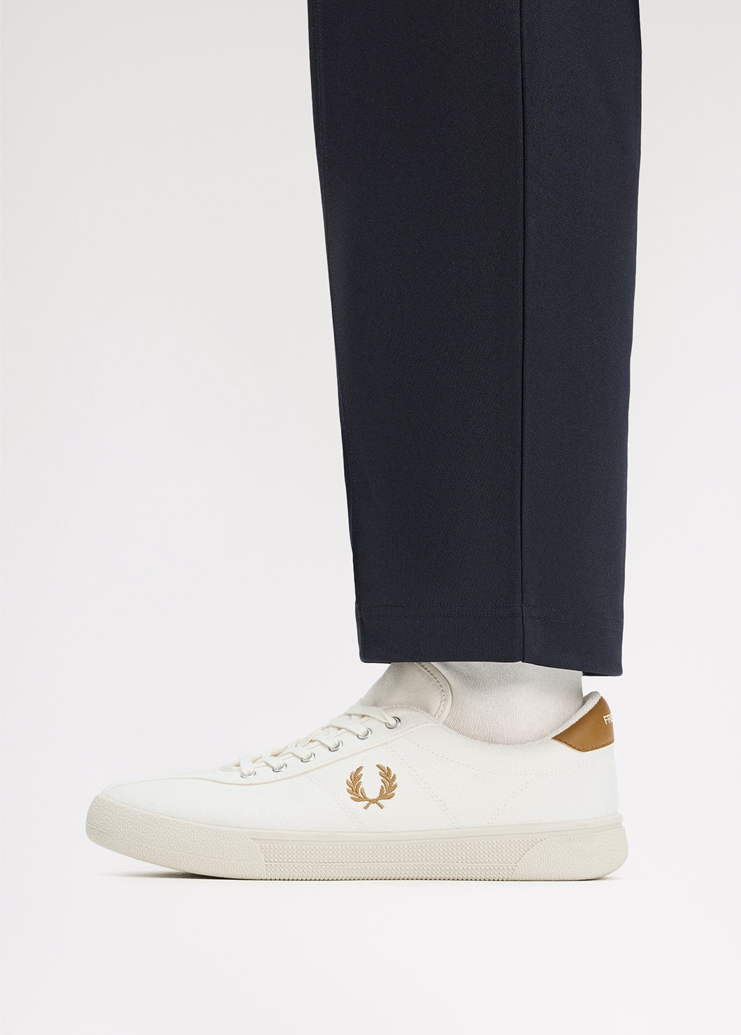 Close up of the Fred Perry Canvas Tennis Shoe in Ecru / Dark Caramel