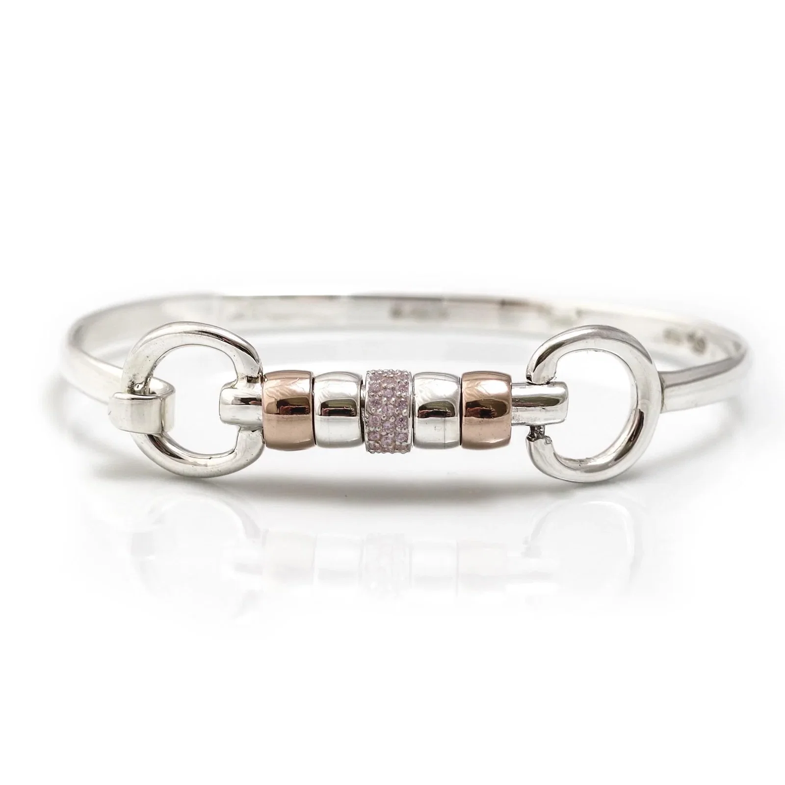Image of Exclusive Sterling Silver & 18ct Rose Gold Plate Cherry Roller Snaffle Bangle With Pink CZ Starlight
