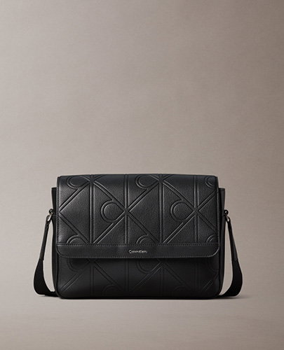 EMBOSSED CK EMBLEM MESSENGER BAG