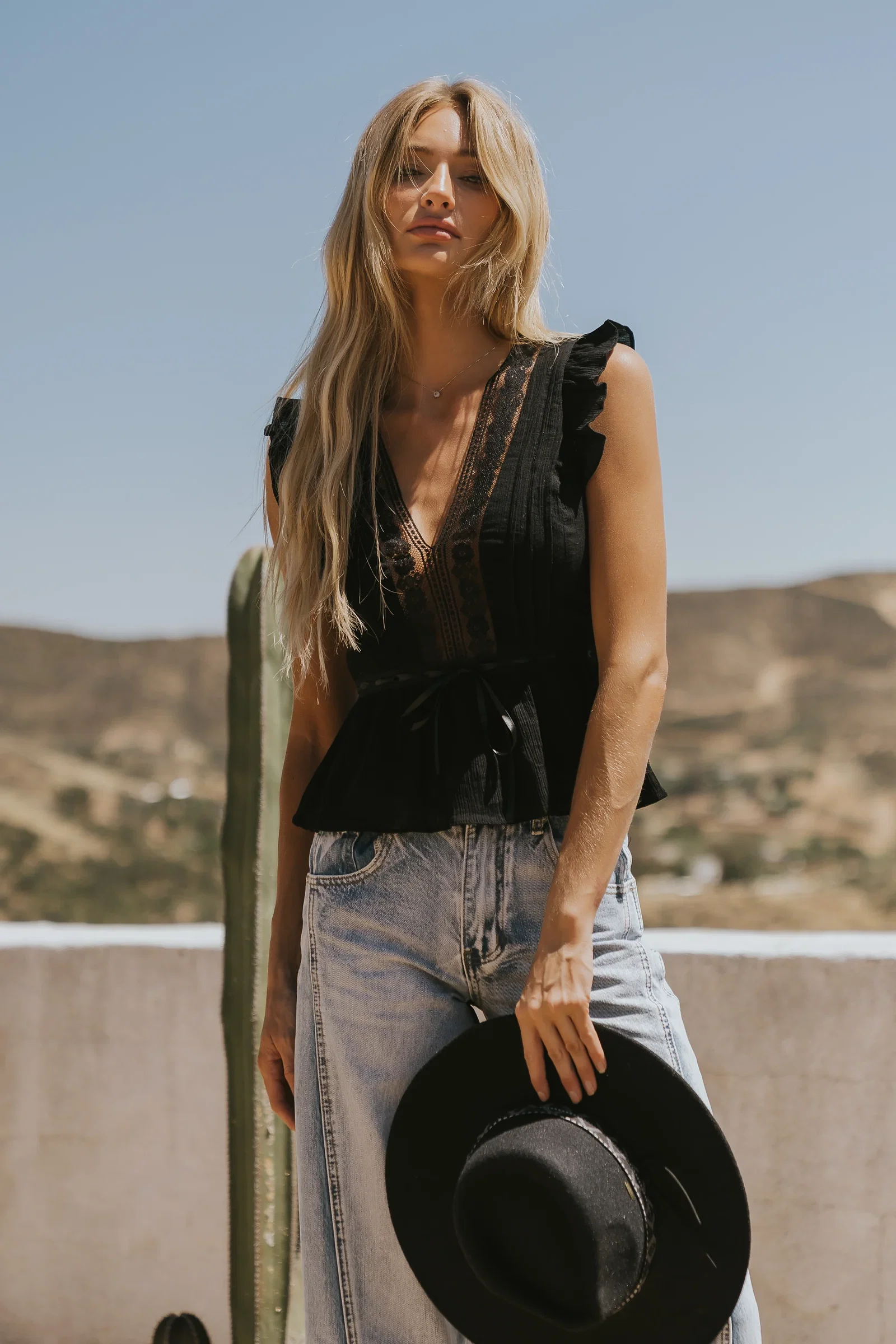 Image of Halsey Peplum Top in Black