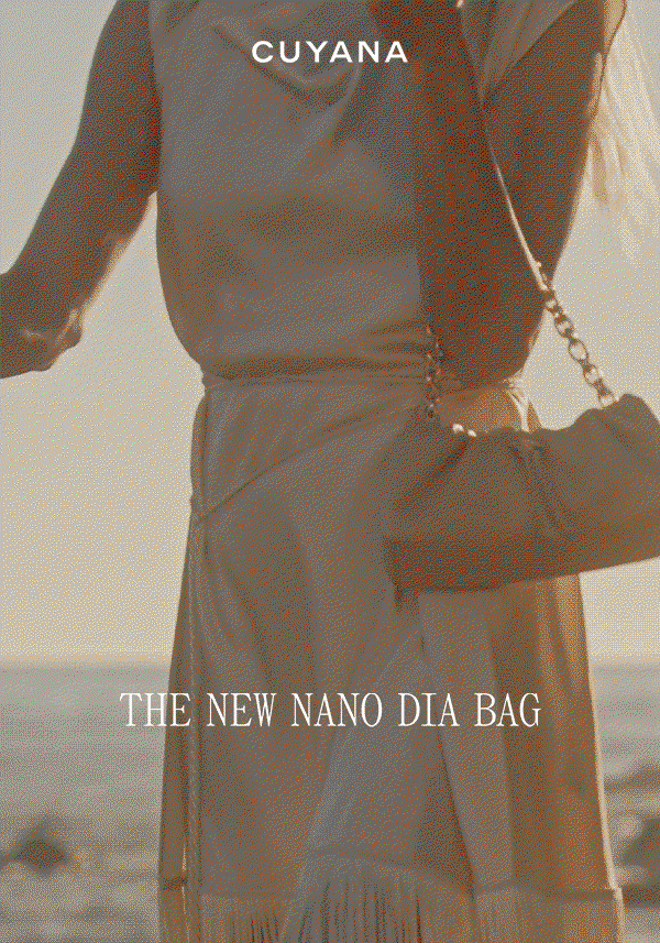 CUYANA THE NEW NANO DIA BAG Nano Dia Bag in Crema with attached Chain Strap.