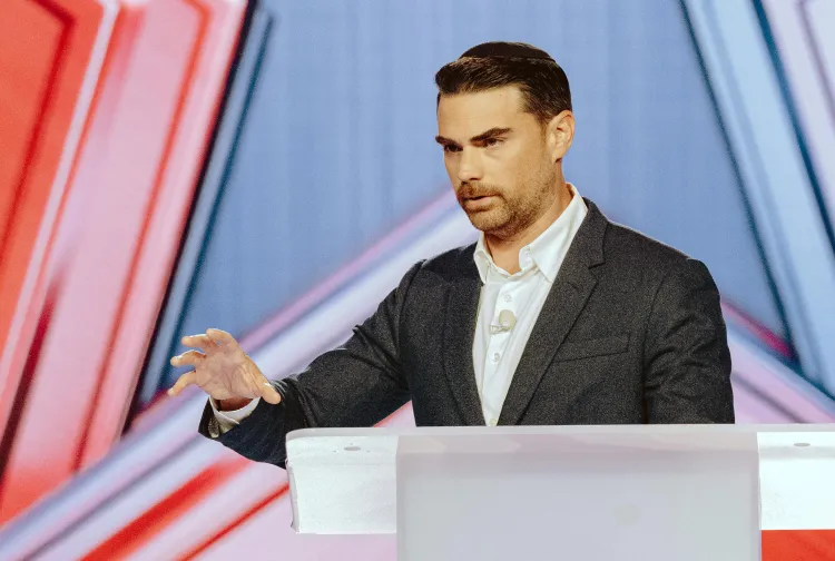 Ben Shapiro speaks during Turning Point USA’s annual AmericaFest conference on December 18, 2025. Olivier Touron/AFP via Getty Images
