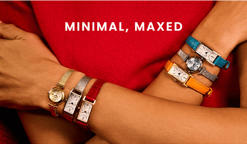 Woman wearing a collection of colorful Citizen watches with leather and bracelet bands. Minimal, maxed.