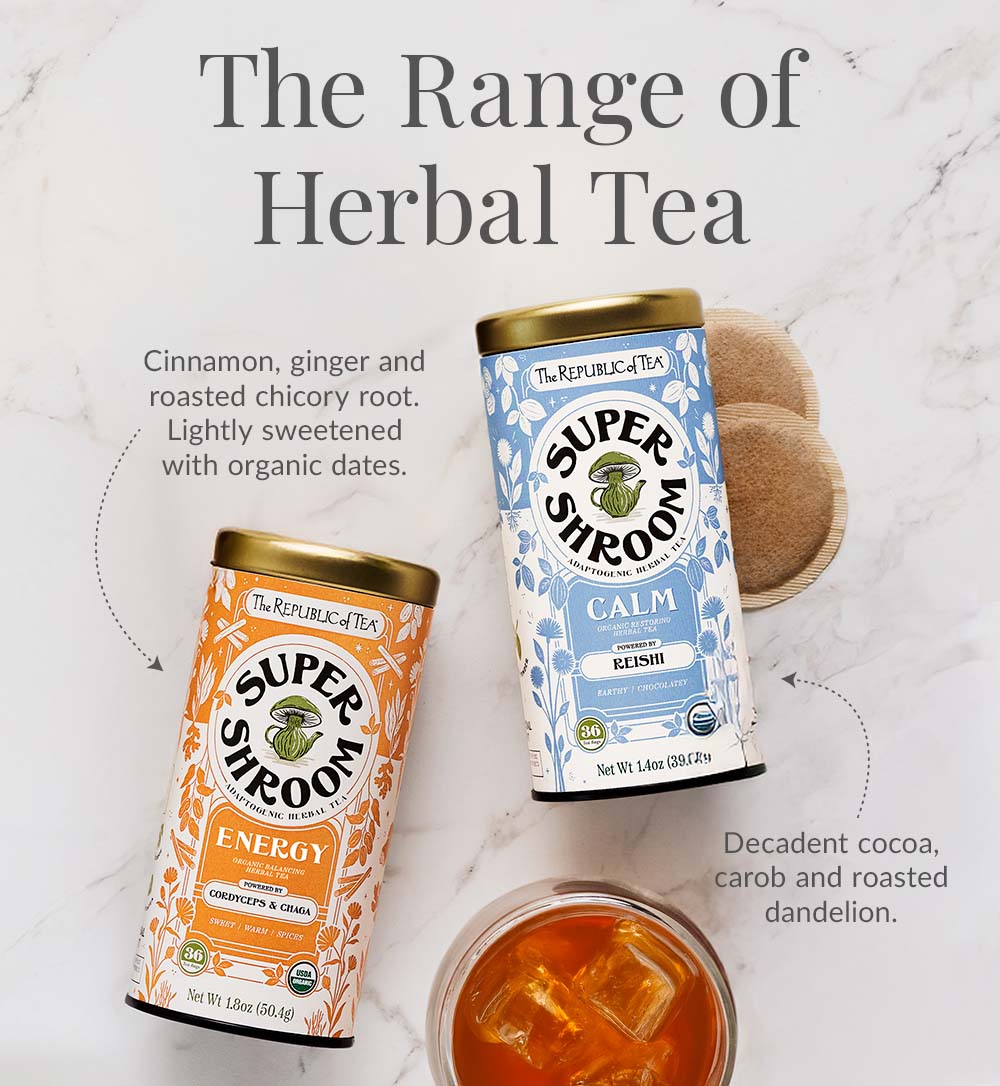 SuperShroom Energy and SuperShroom Calm tins with teacup a tea bags on marble