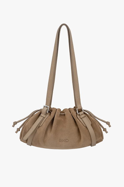 Brown suede shoulder bag with drawstring closure and long straps.