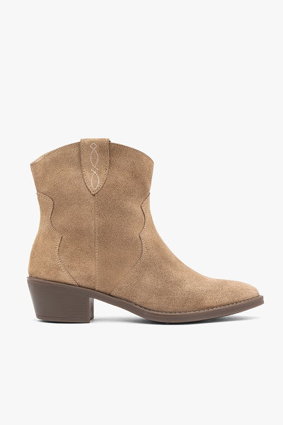 Tan suede ankle boot with low heel and decorative stitching on a white background.