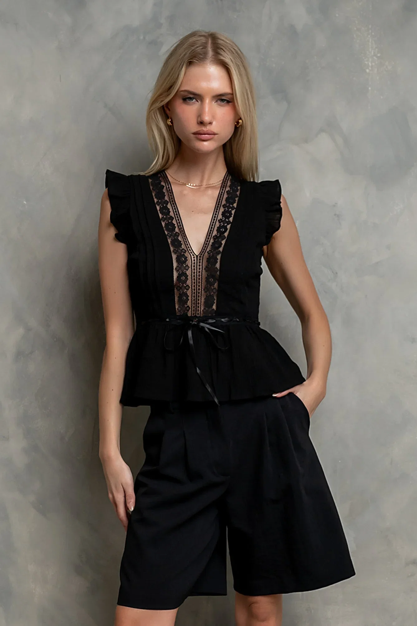 Image of Halsey Peplum Top in Black