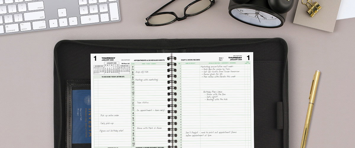 Overhead shot of an open Day-Timer appointment book 