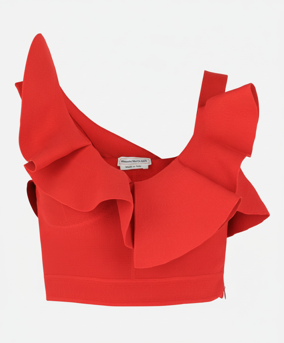 A red Alexander McQueen crop top with dramatic ruffles and a single strap.