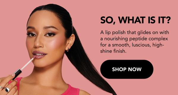 model holding Full on lip polish