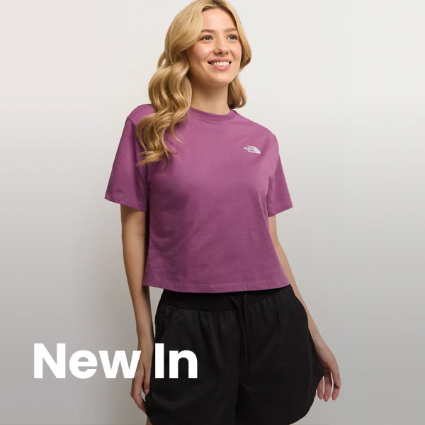 Female models wears Women's Evolution Simple Dome Cropped Relaxed T-Shirt with title The North Face New In 