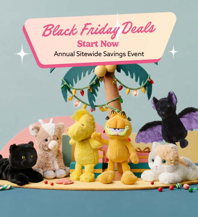 Warmies on a beach with gifts. Shop The More the Merrier Sale.