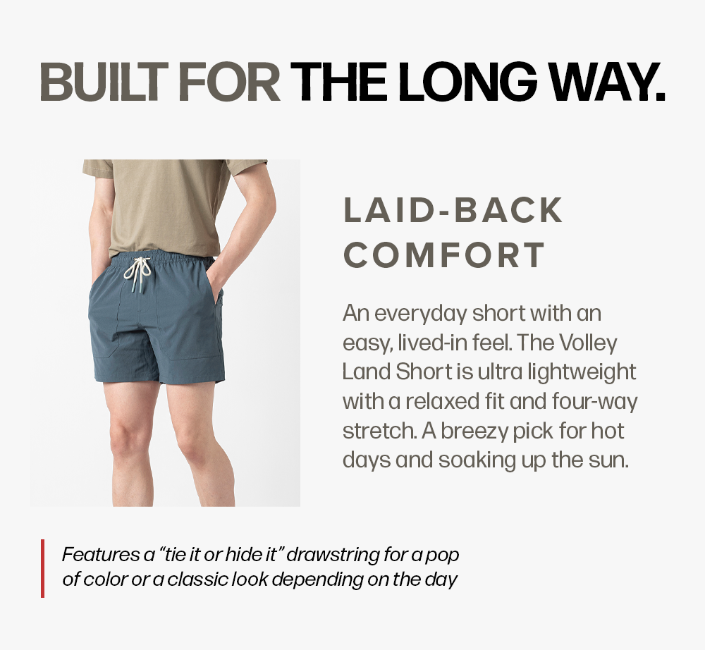 A person wears blue shorts and a tan shirt on a white background. Text reads: 'Built For The Long Way. Laid-Back Comfort An everyday short... Features a “tie it or hide it” drawstring...'