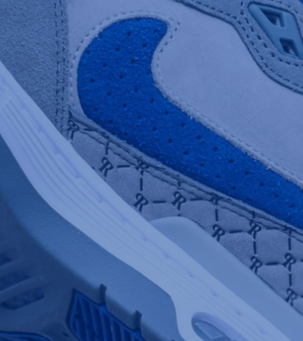 Shop the new Nike P-Rod 1's dropping in Dodgers Blue | A zoomed-in photo of the shoes, with a blue filter on top