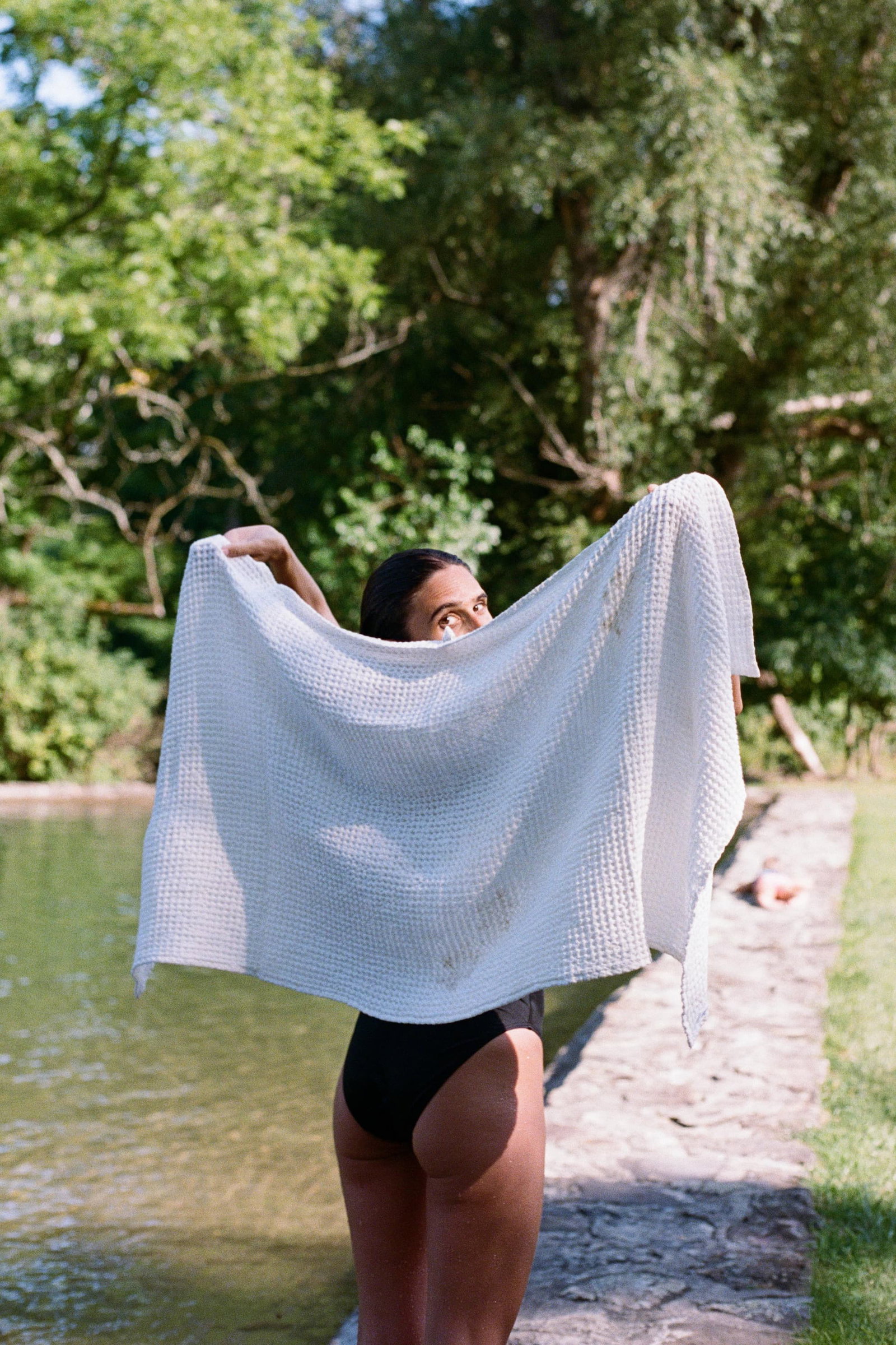 woman toweling off after a swim