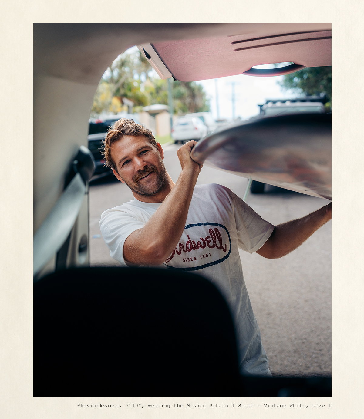 Kevin, 5'10", wearing the Mashed Potato T-Shirt - Vintage White, size L