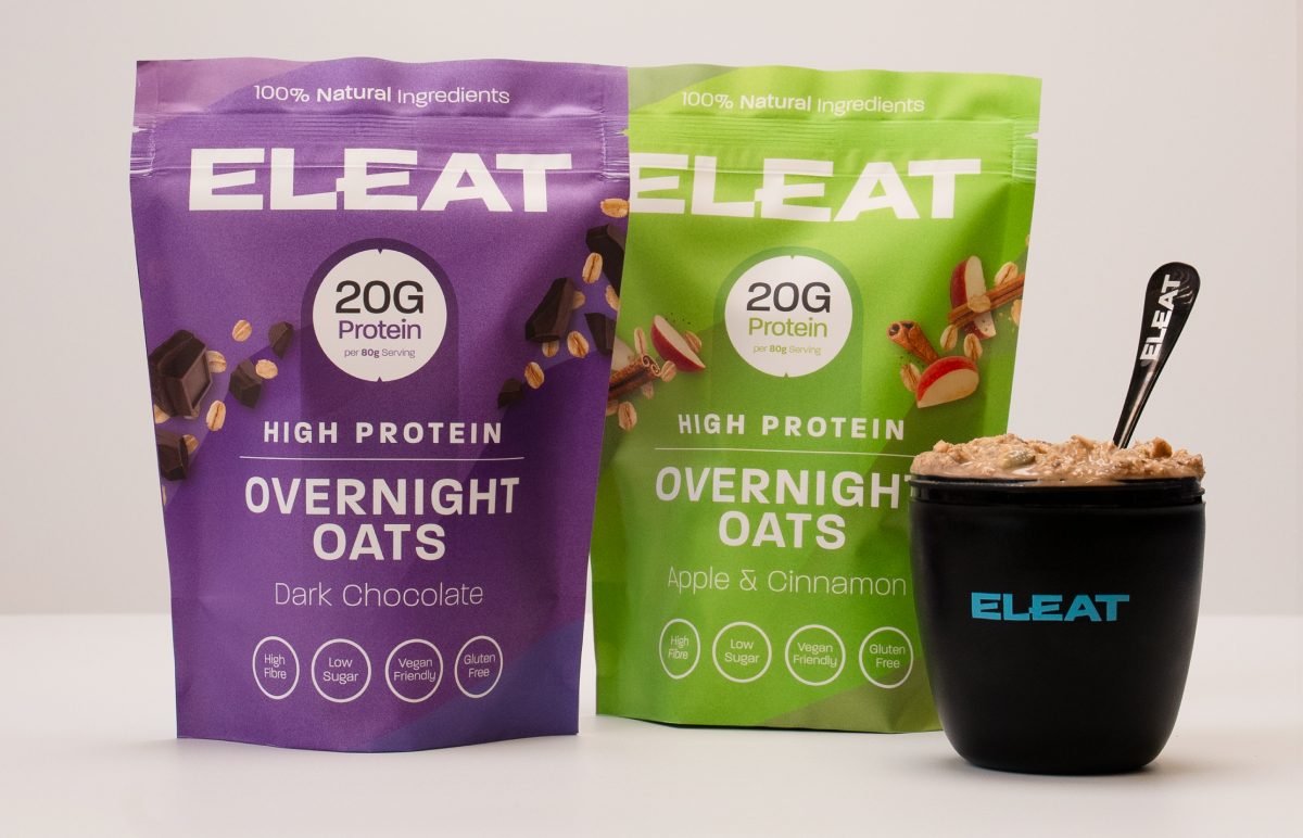 Two packets of Eleat high protein overnight oats in dark chocolate and apple & cinnamon flavors.