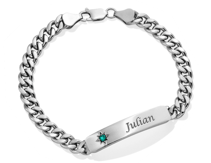 Silver bracelet with the name Julian on a silver nameplate. 