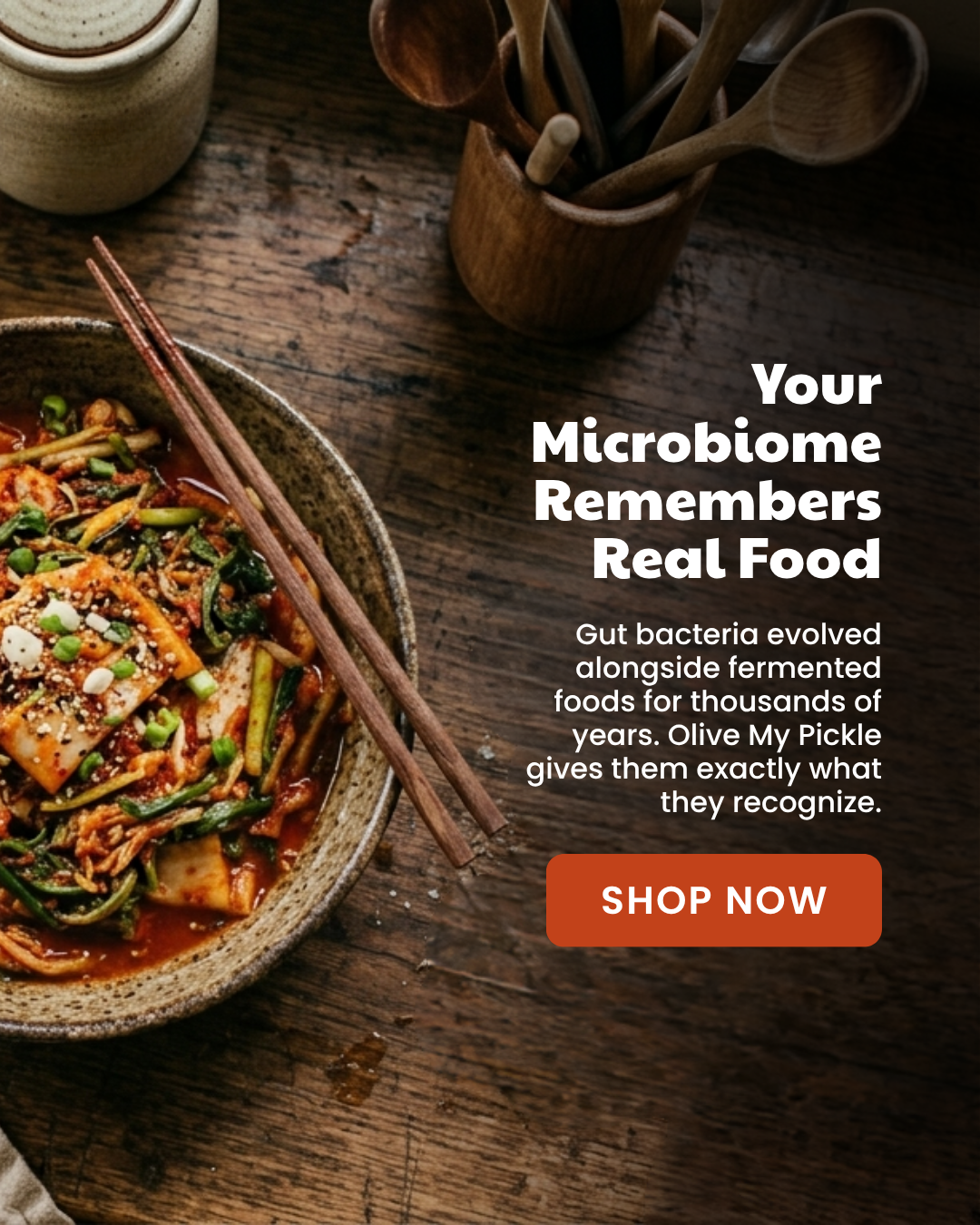 A bowl of kimchi on a rustic wooden table with overlay text about fermented foods and a 'Shop Now' button.