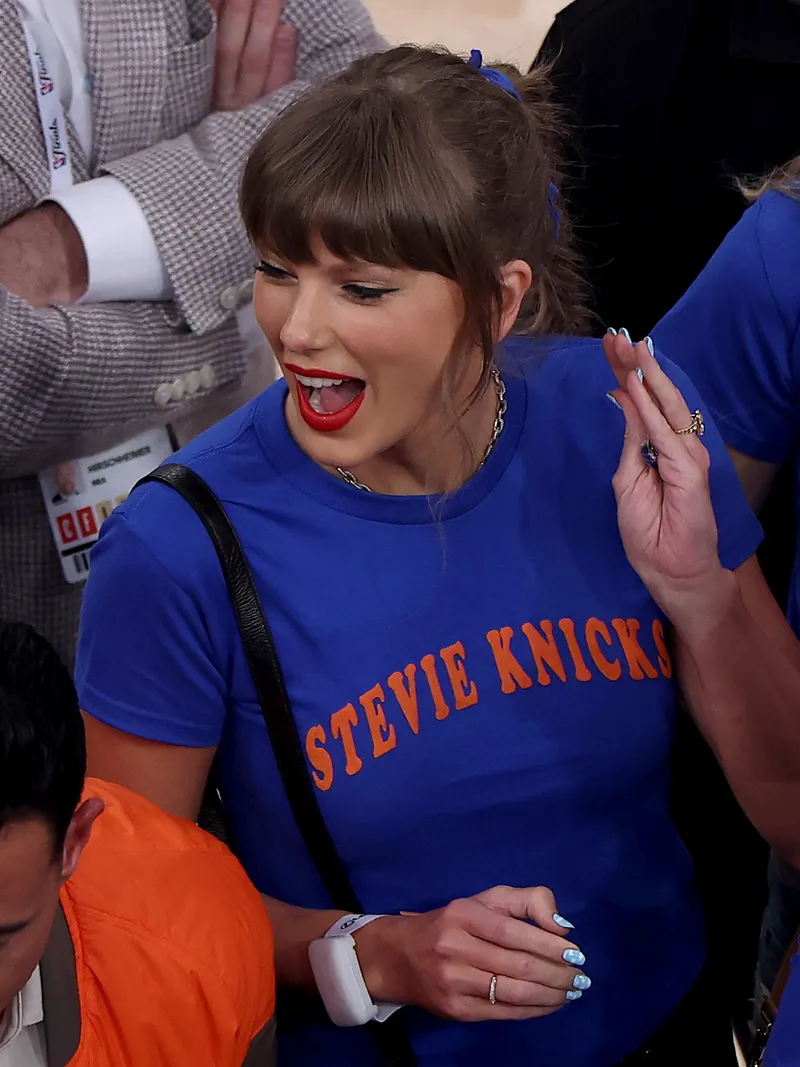 Image may contain: Taylor Swift, Head, Person, Face, Adult, and Happy
