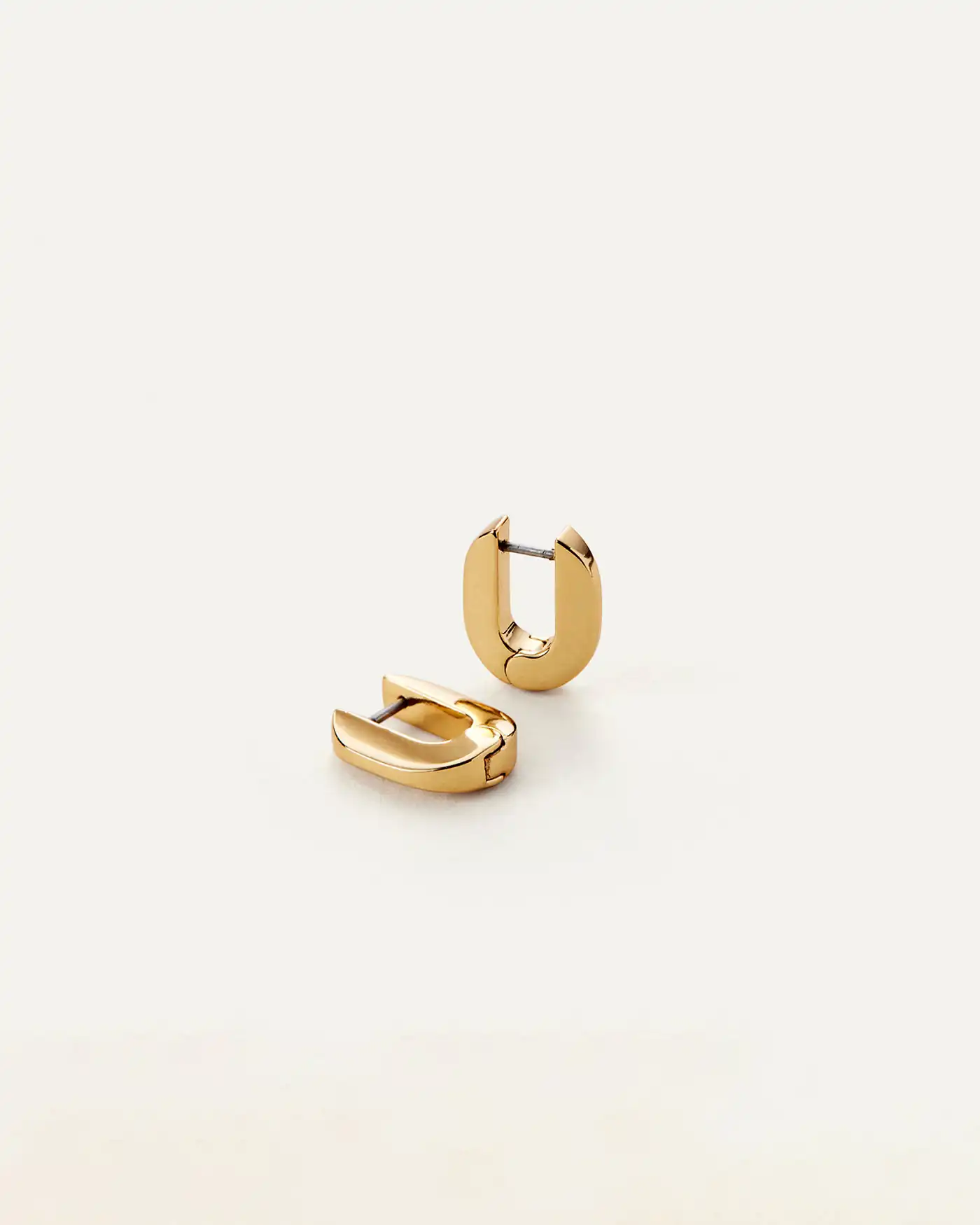 These best selling, wear-with-everything tiny huggie hoop earrings complete your ear stack, but are bold enough to be worn alone. They open and close ...