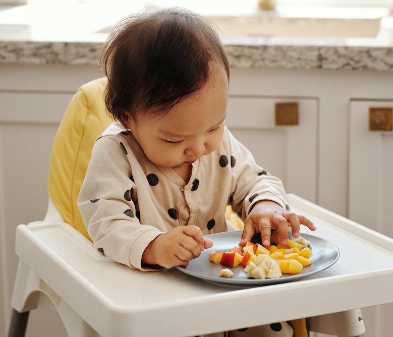baby in a high chair 