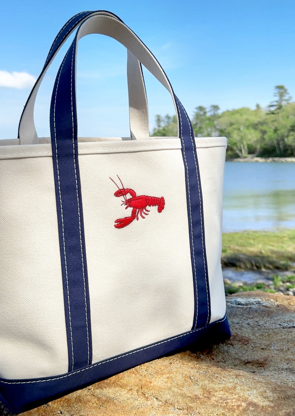 Limited edition Boat and Tote Bag with a lobster motif.