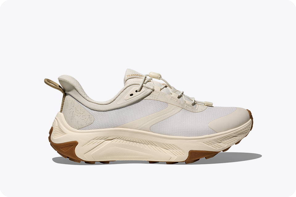 A side view of the Transport 2 lifestyle shoe in a beige and white colour scheme.