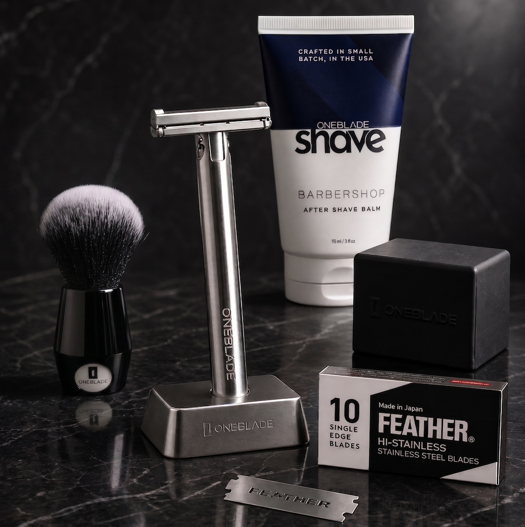 A luxury OneBlade shaving set with razor, brush, balm, and blades.