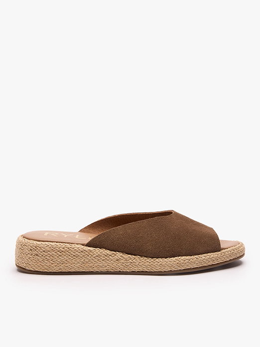 Brown suede espadrille slide sandal with woven jute sole on white background.