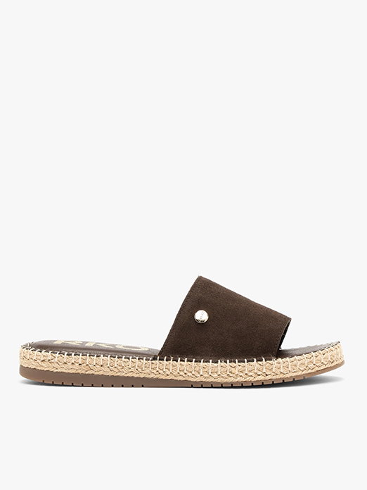 Brown suede slide sandal with woven jute sole on white background.