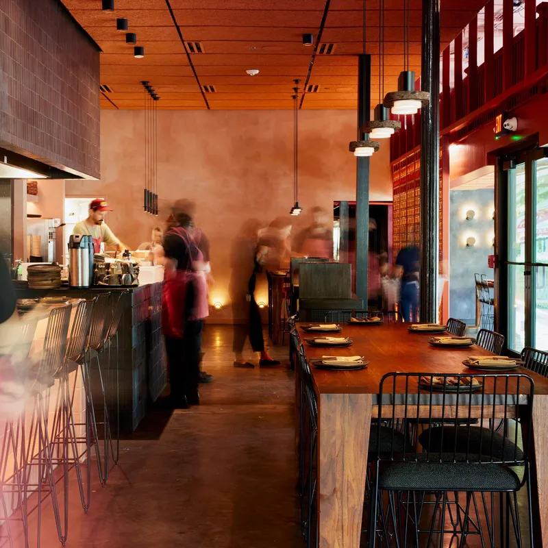 Image may contain: Indoors, Restaurant, Cafeteria, Dining Table, Furniture, Table, Architecture, Building, and Dining Room
