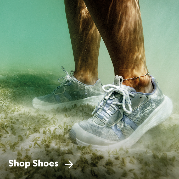 Image of Columbia PFG shoes being worn under water. 