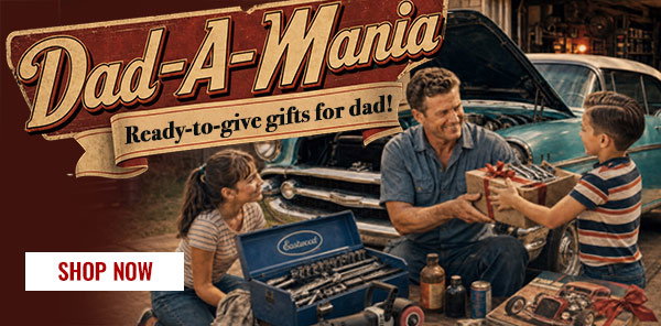 Dad receives a gift from his son in a garage setting, promoting Dad-A-Mania ready-to-give gifts for Father's Day.