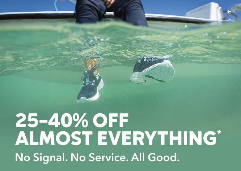 Image of angler with their shoes submerged in water while they sit on a boat. 25–40% Off Almost Everything.