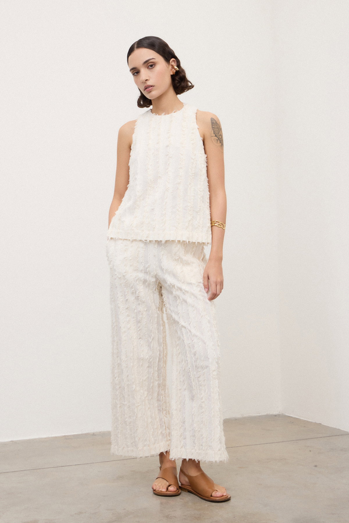 Pantaloni palazzo con texture
