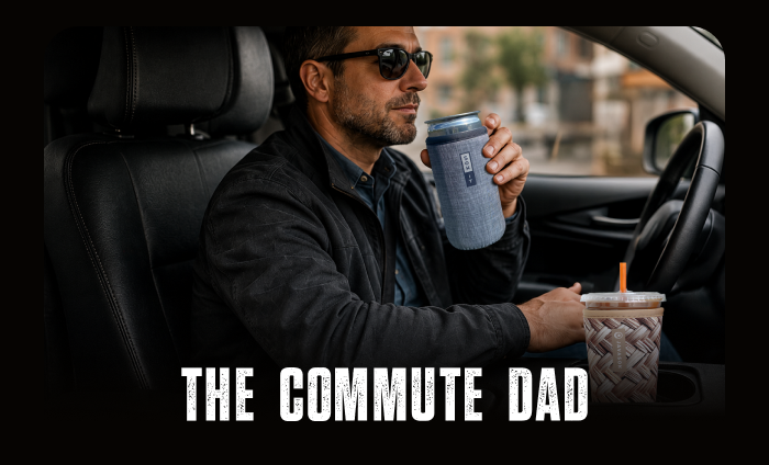 Dad sipping from a travel tumbler while driving.