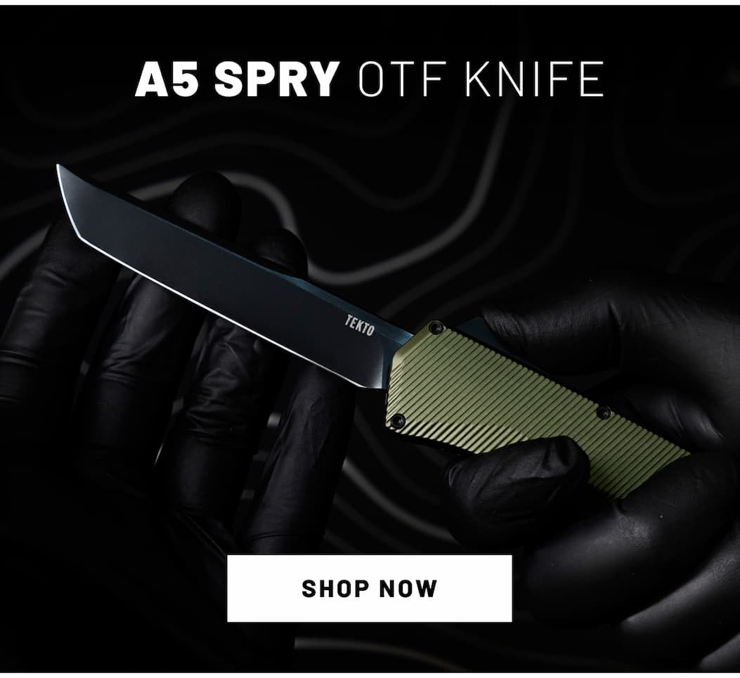 A5 Spry Automatic OTF Knife with Green handle and tanto blade in hand